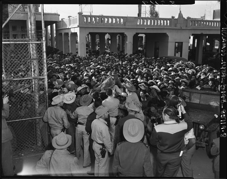 Mexican workers wait in Mexicali for legal employment in the U.S.